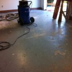 failing epoxy flooring being removed.